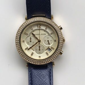 Gold and navy blue Michael Kors watch.
